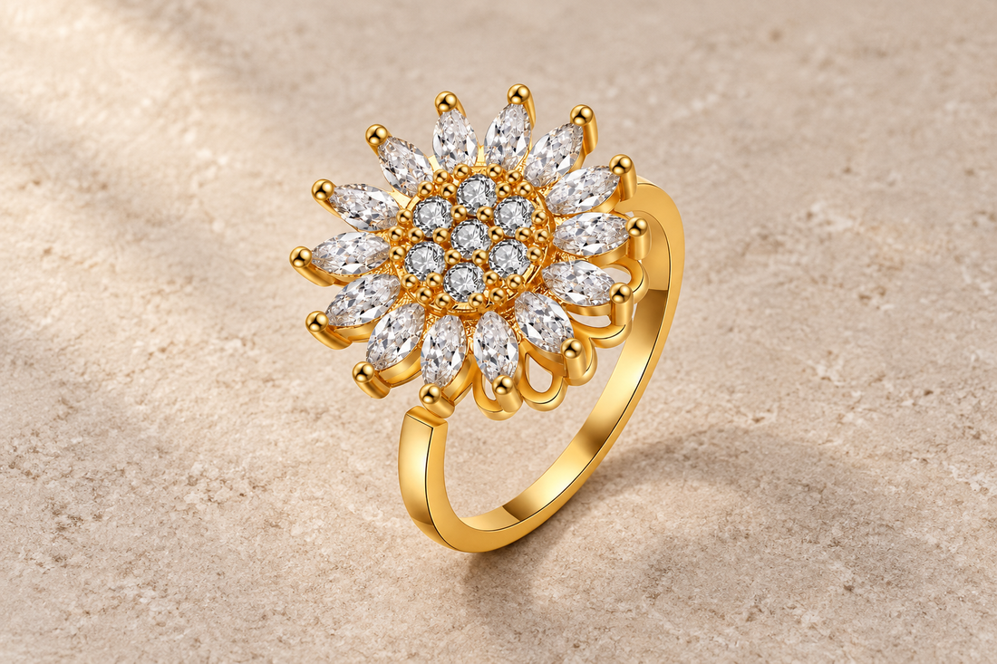 The Sunbloom Ring with clear marquise crystal petals and a gold-tone band.