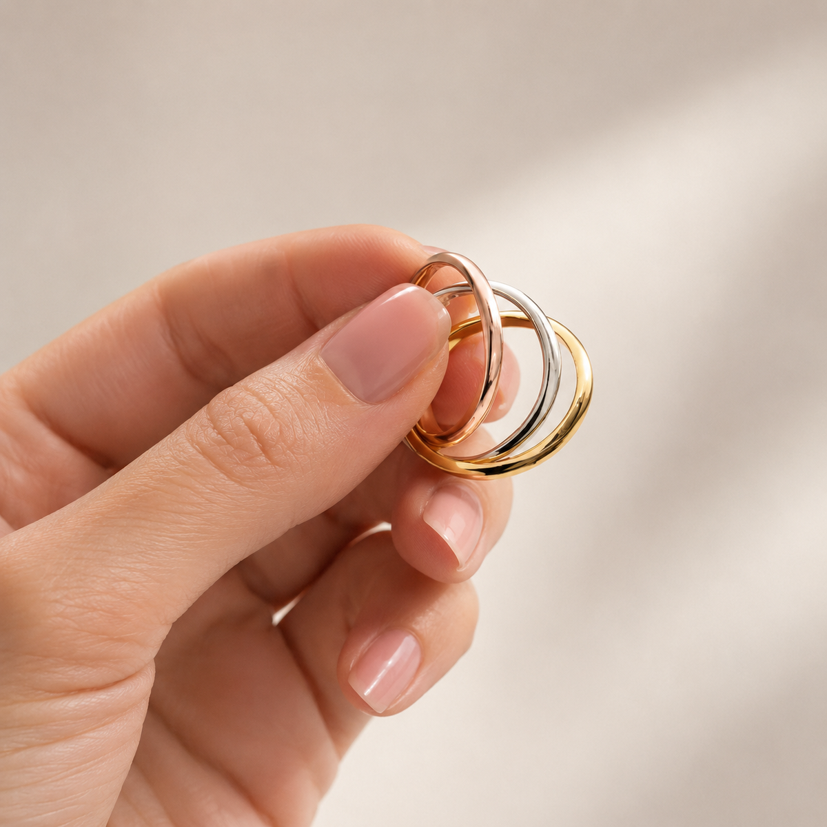 Trio fixed-size interlocking ring close-up