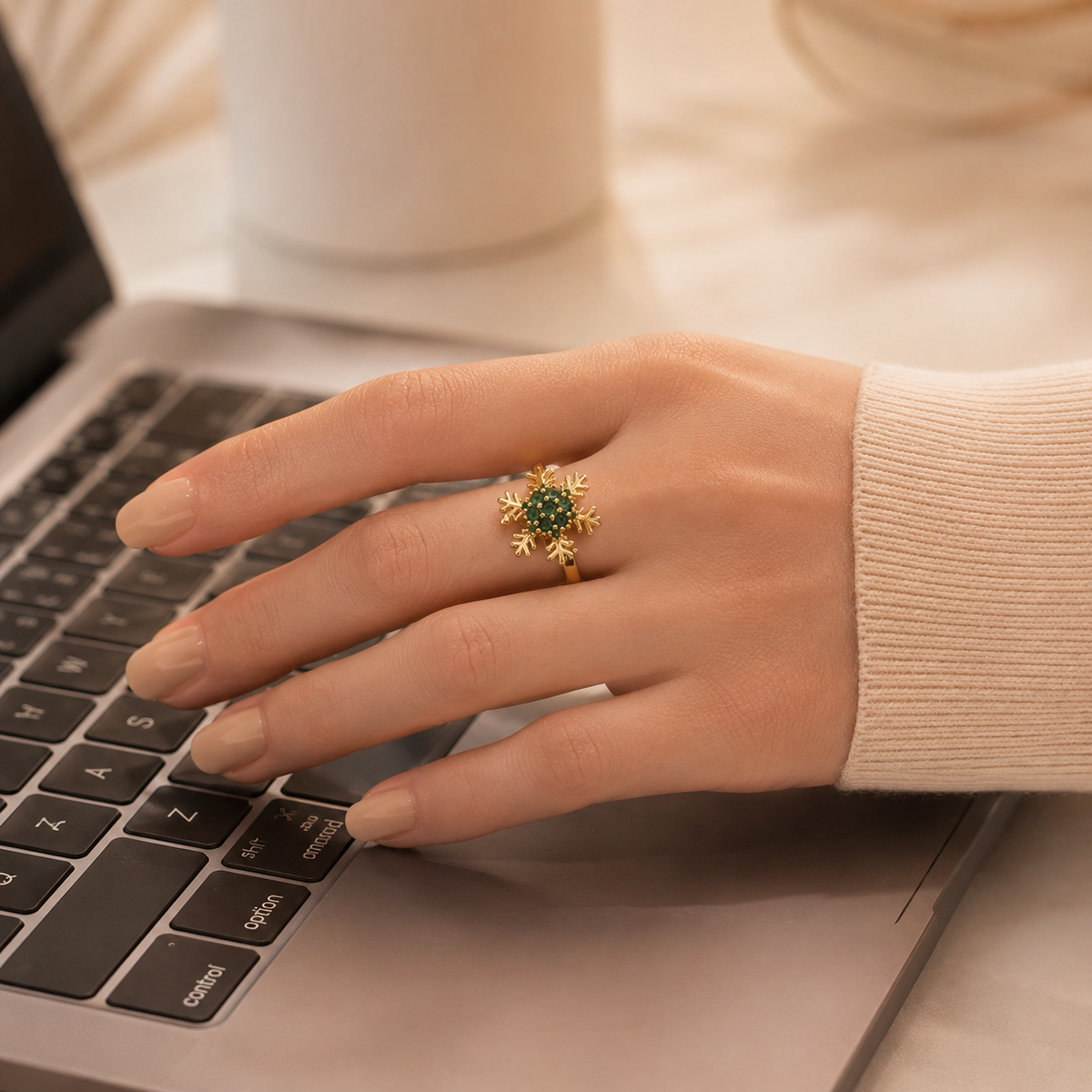 Frostbloom gold-tone snowflake ring close-up