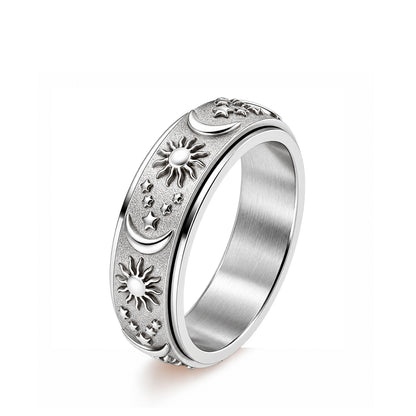 The Cosmos Ring viewed from above, showing the engraved celestial texture