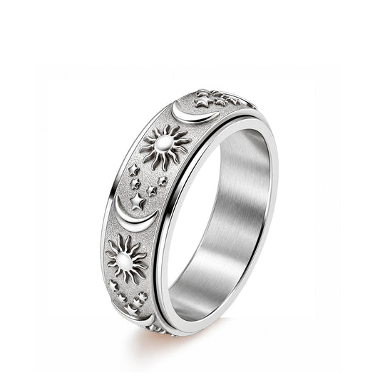 The Cosmos Ring viewed from above, showing the engraved celestial texture