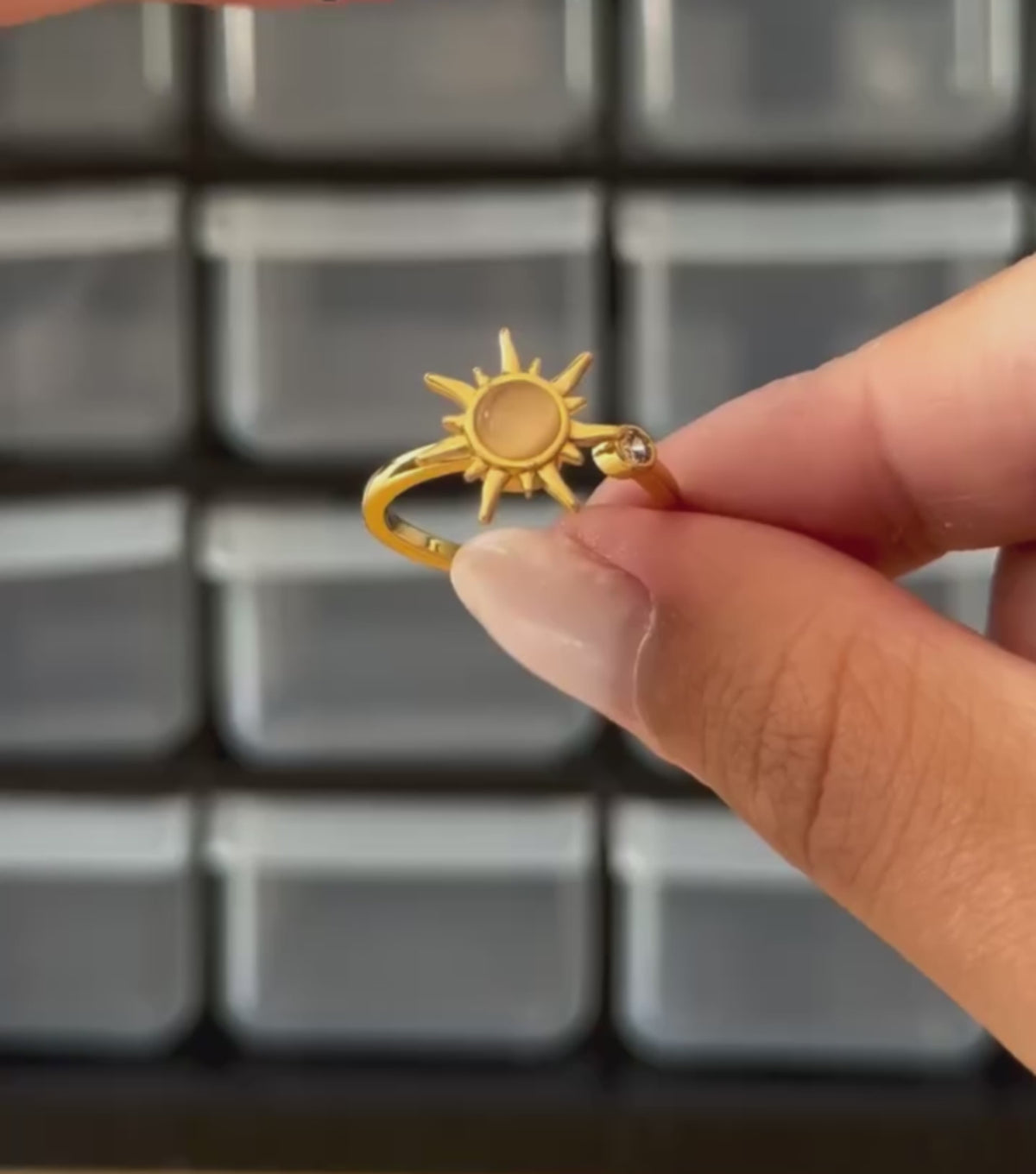 The Sunstone Ring sun-inspired spinner in motion
