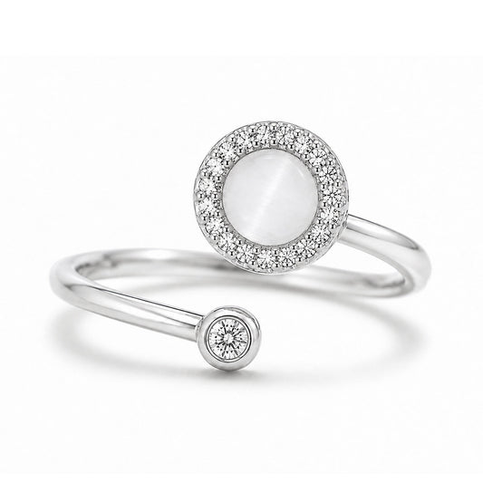 The Lunar Ring in silver with a moonstone-effect centerpiece and crystal halo